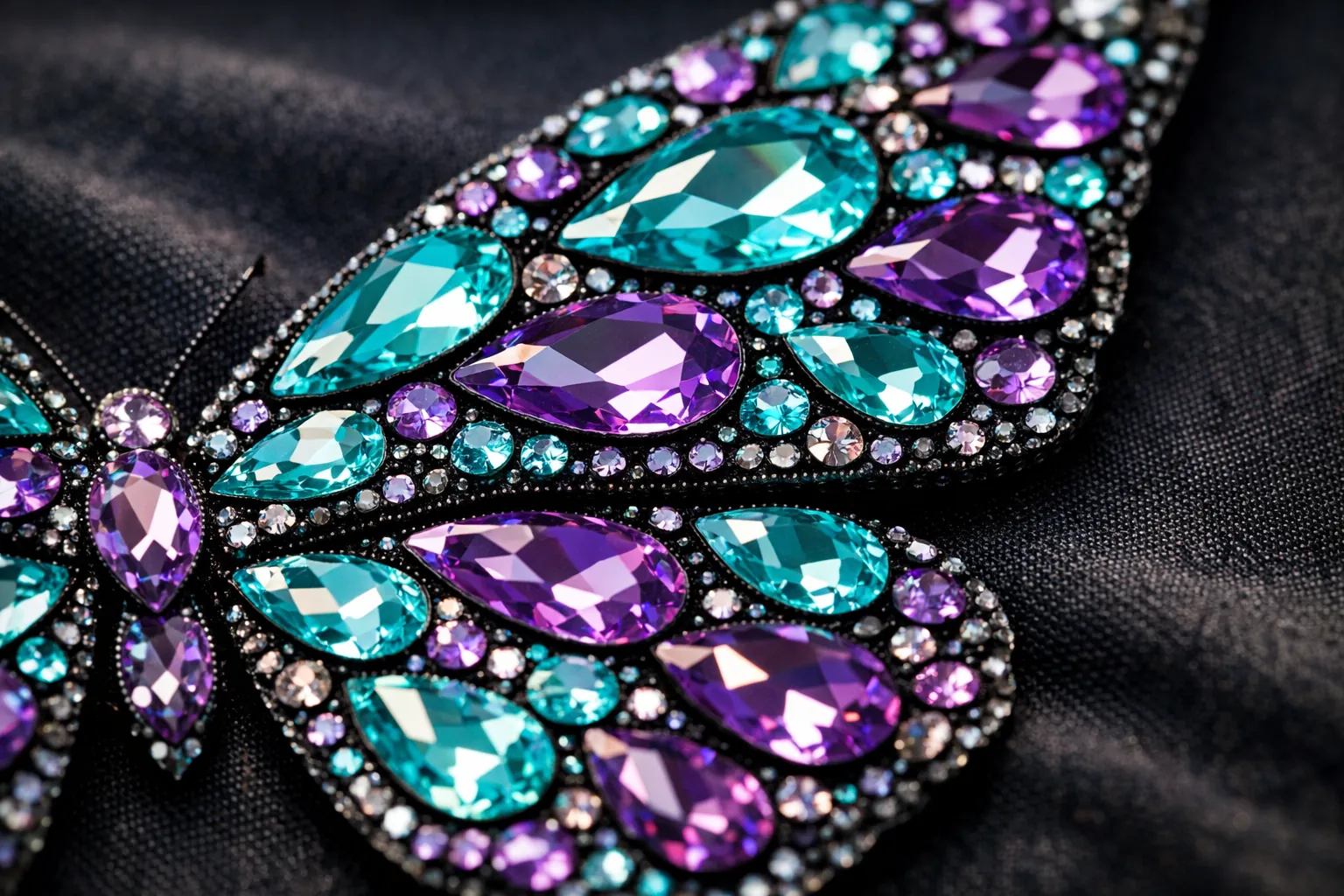 Close-up of a butterfly wing made from teardrop and round crystals